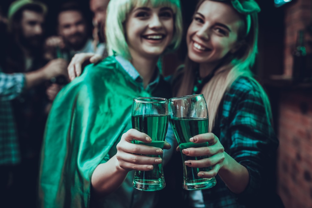 Friends Celebrating A Saint Patrick's Day At Pub