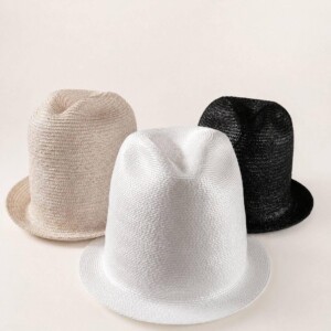 Three hats made by J. Faulk in beige, white, and black